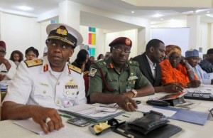 Nigerian navy and military medical directors attend the second general meeting with Nigeria's Health Minister Chukwu during a media briefing on updates regarding the ongoing national Ebola disease outbreak, in Abuja